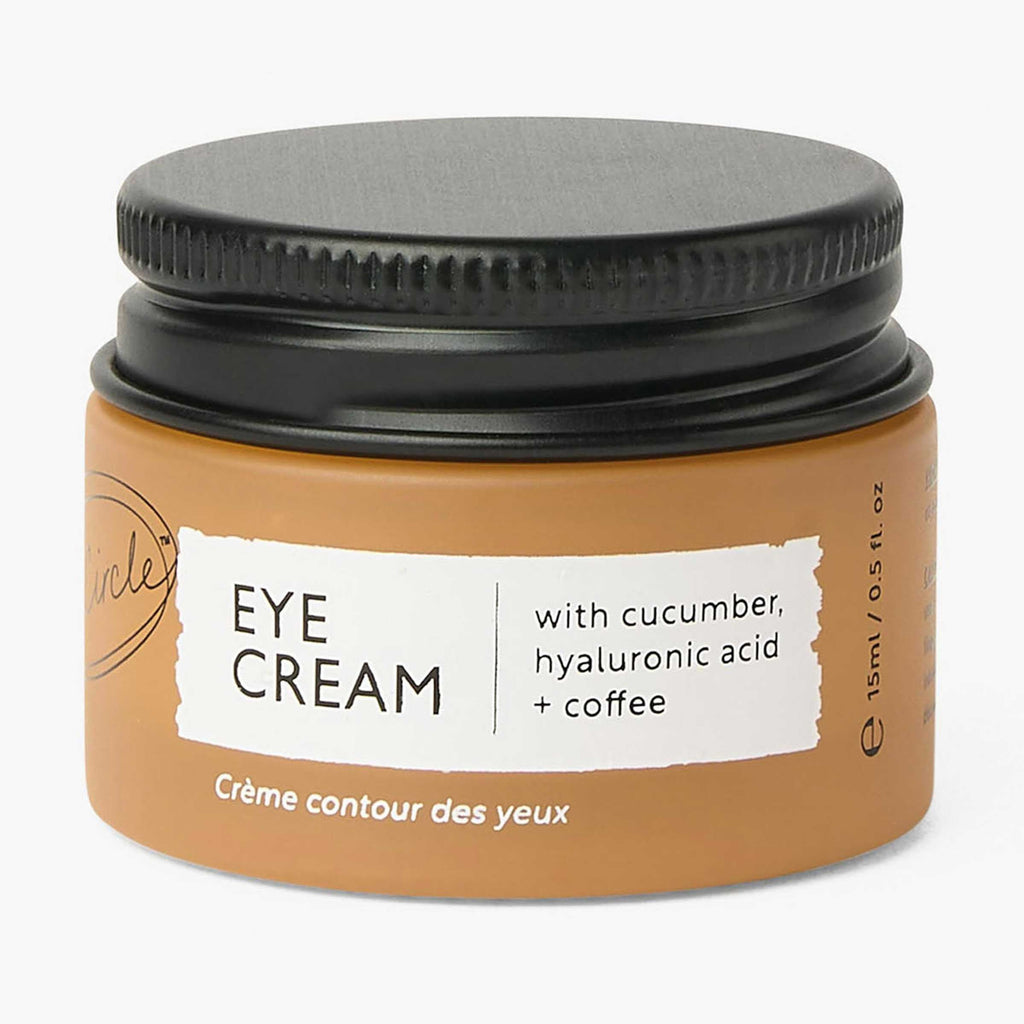 "Hyaluronic acid eye cream with coffee by UpCircle, glass jar product view"