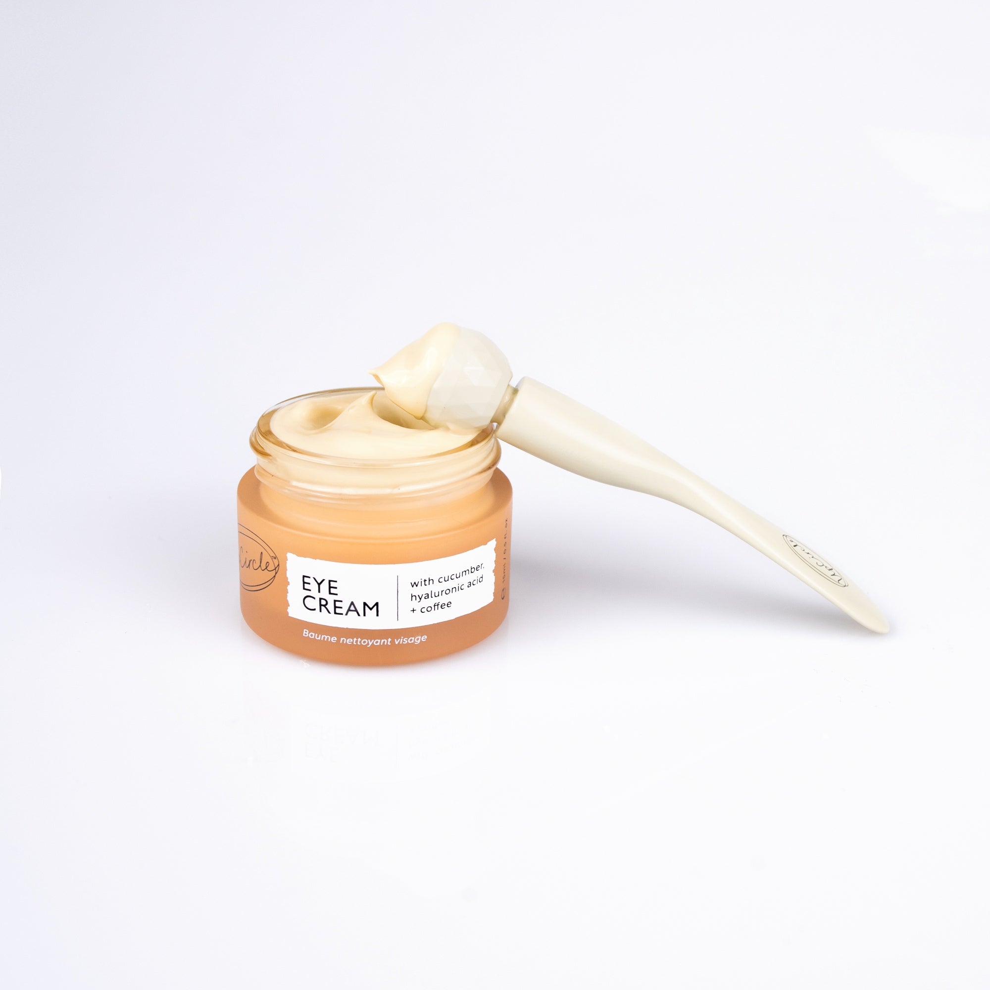 "Hyaluronic acid eye cream with coffee by UpCircle, glass jar product view"